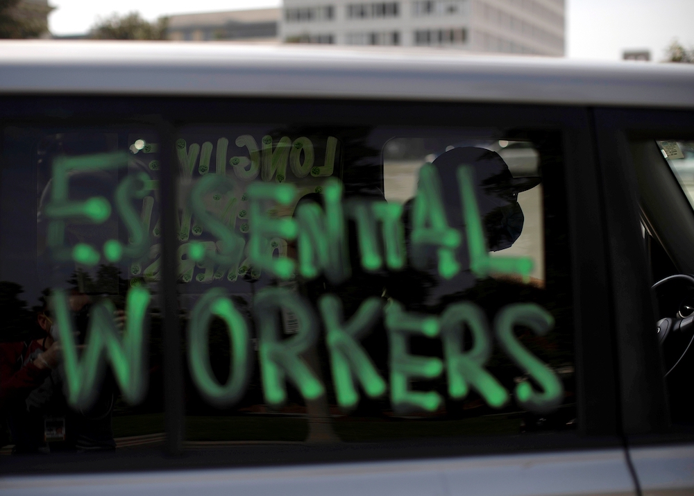 A car window in Pasadena, California, is painted with “essential workers” April 29, 2020. (CNS/Reuters/Mario Anzuoni) A car window in Pasadena, California, is painted with “essential workers” April 29, 2020. (CNS/Reuters/Mario Anzuoni)